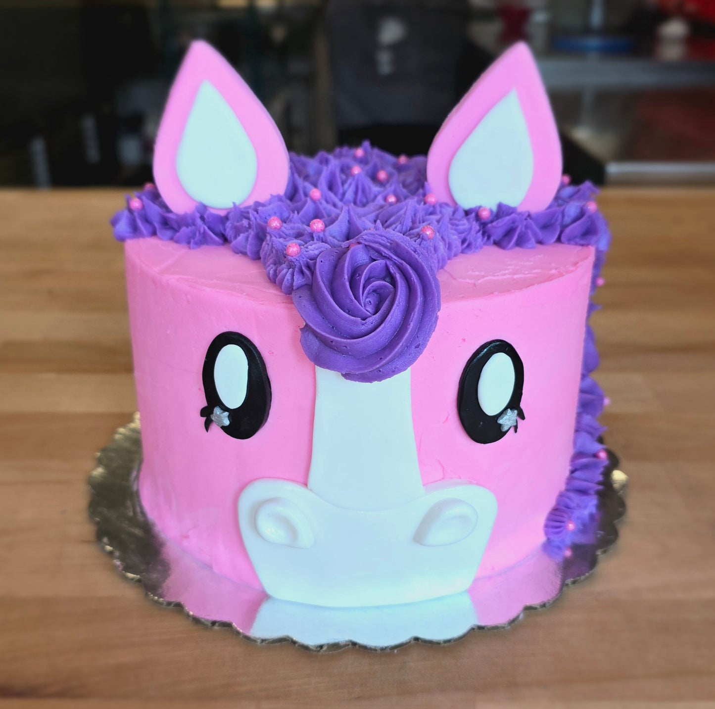 pink and purple pony or horse cake